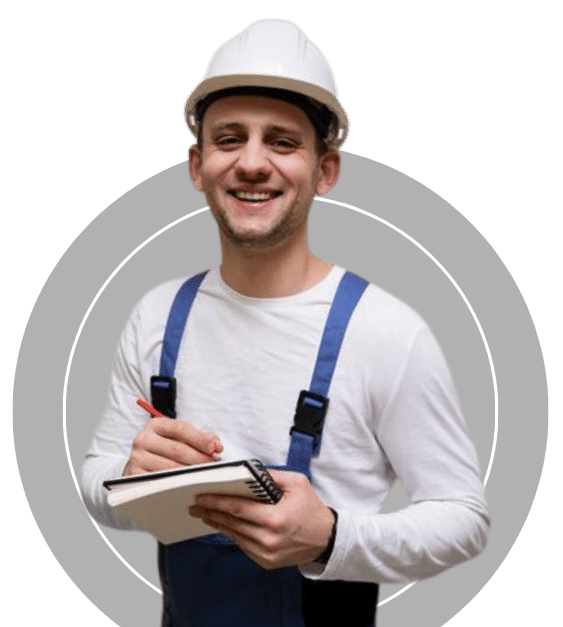A boiler repairer is smiling & holding a notebook